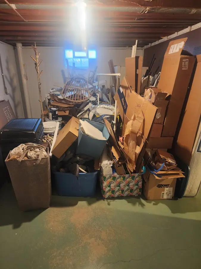 Roll-off dumpster container at job site for 4 Yard Dumpster Rental in Parsons